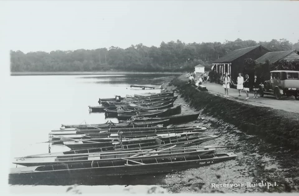 Rowing Boats linded up at Ruislip Lido