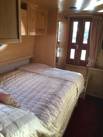 Shared narrow boat Breaking Dawn