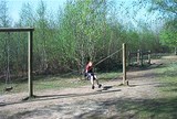 Swinging on a Ruislip Lido Climbing Frames